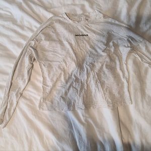 White long-sleeve new balance cropped tee